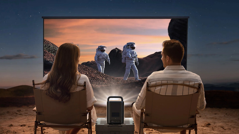 couple watching movie outdoors