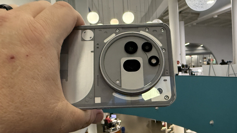 Nothing Phone (3a) Pro in a man's hand