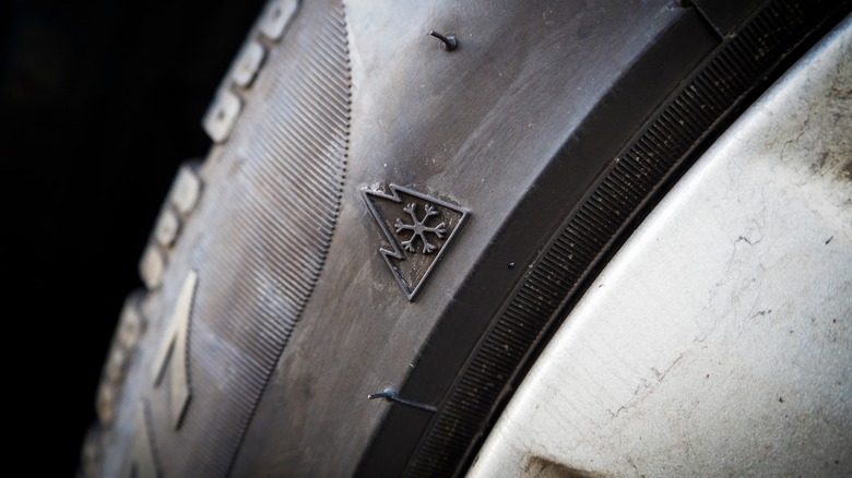 Tire showing close up of three peak mountain snowflake symbol