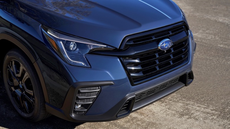 Front end of a Subaru Ascent parked on a paved surface