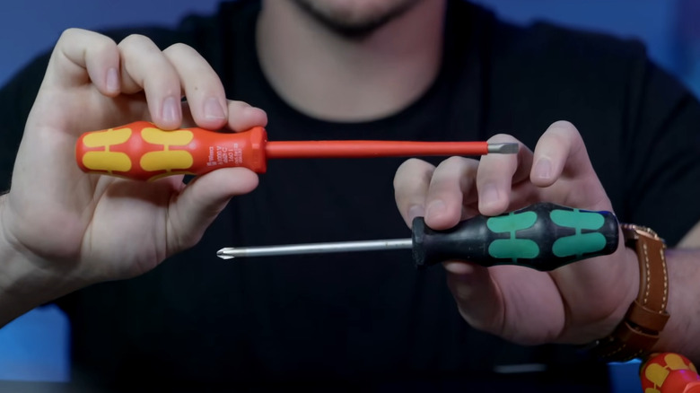 Man holding two different Wera screwdrivers